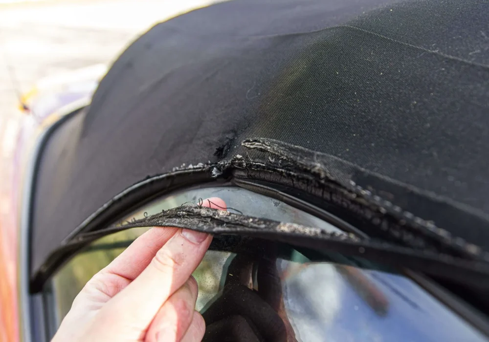 Car+roof+being+damaged+with+hands-1920w