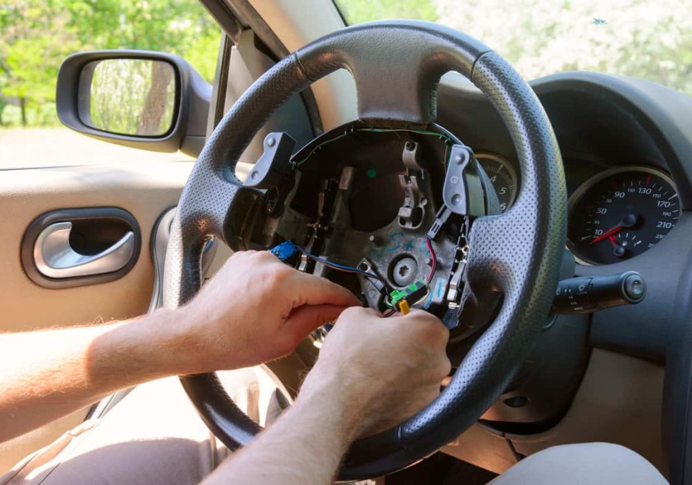 Disconnecting-of-horn-and-cruise-control-wiring-in-LHD-mounted-driving-wheel